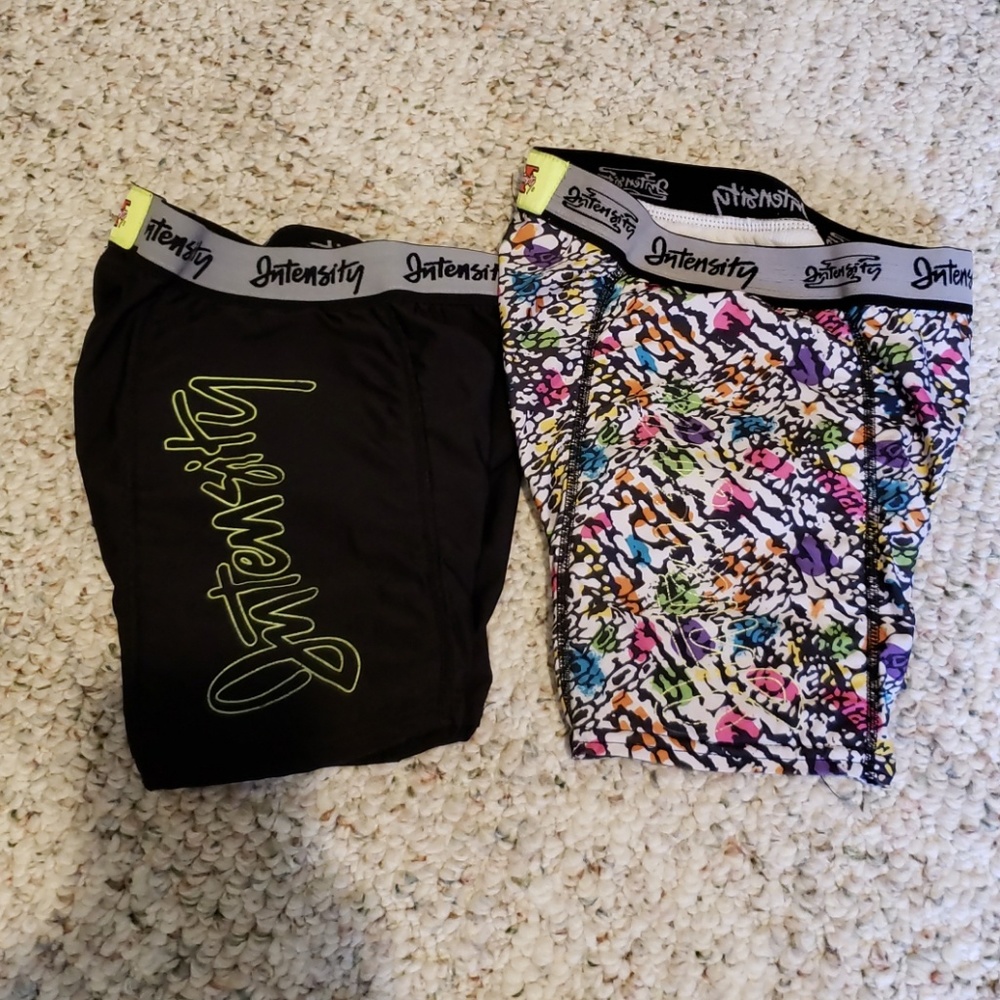 Two pair of softball slides